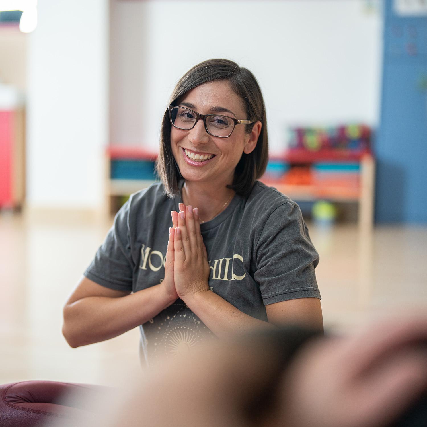 Maria im Yoga-Kurs